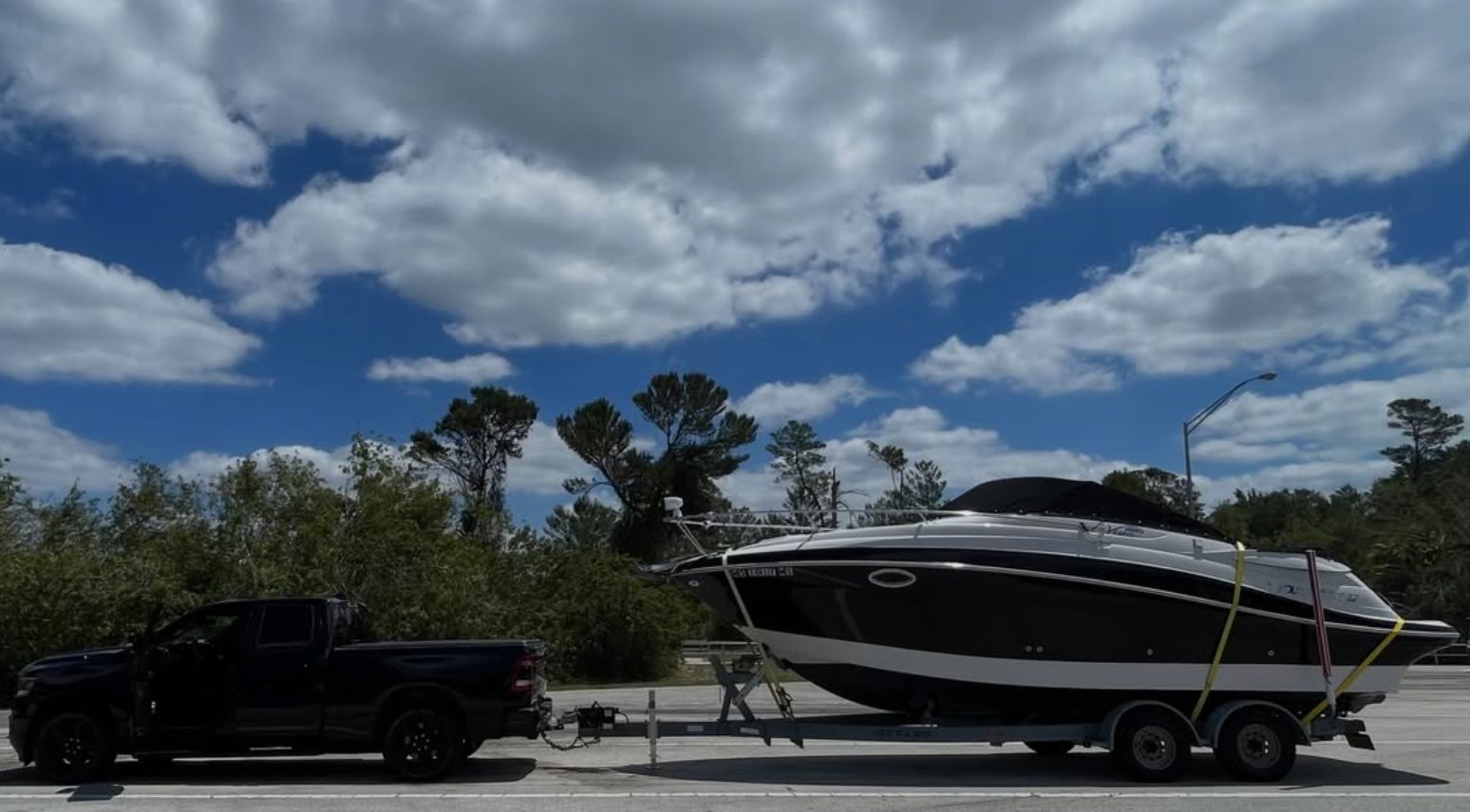 Boat on its dual axle trailer on the road